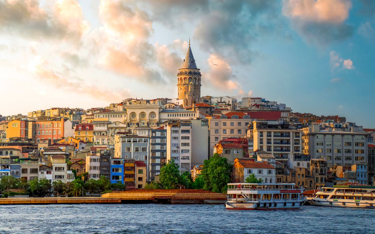 a city with a boat on the water